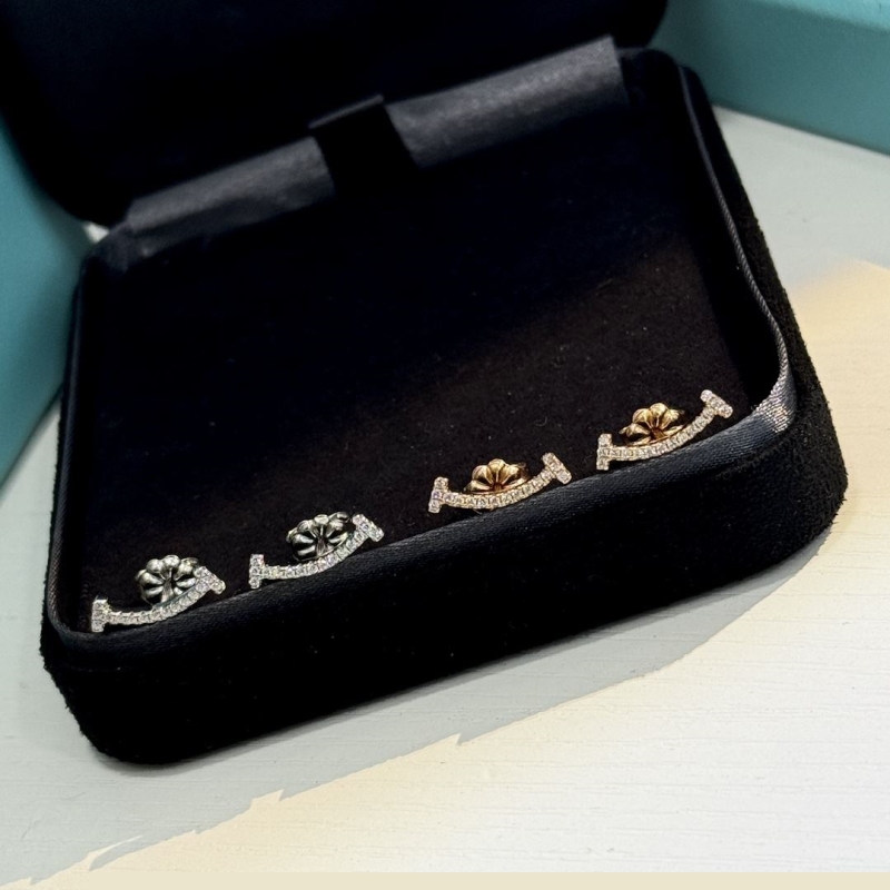 T*f*ny earrings